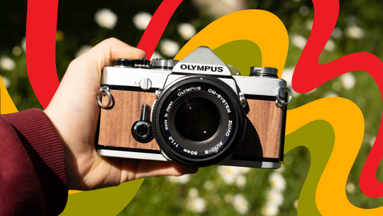 Wood covered Olympus OM-1 35mm film camera SLR for beginners