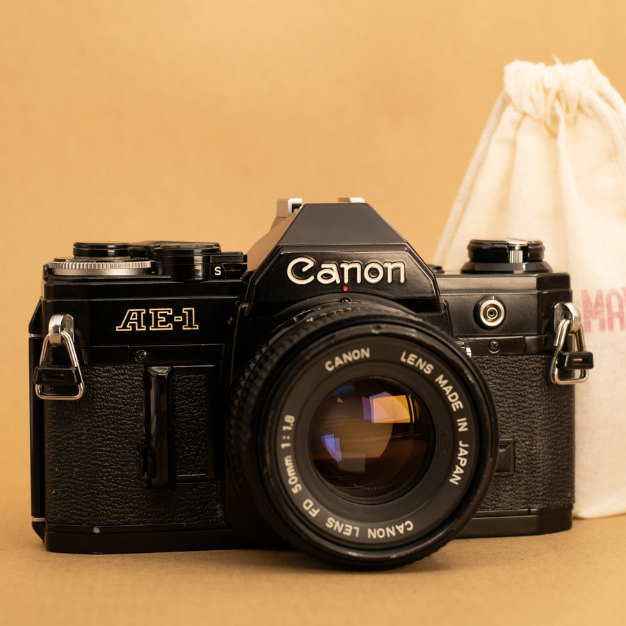 Black Canon AE-1 with 50mm f/1.8 Lens