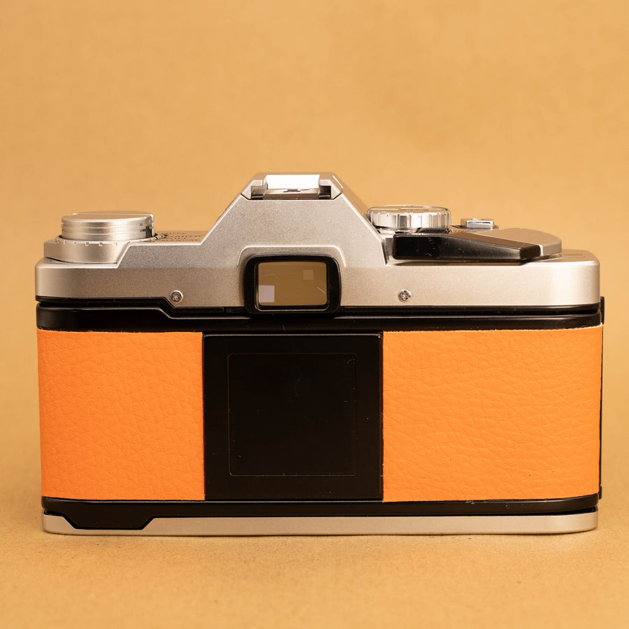 Olympus OM30 in Orange with 50mm f/1.8 Lens