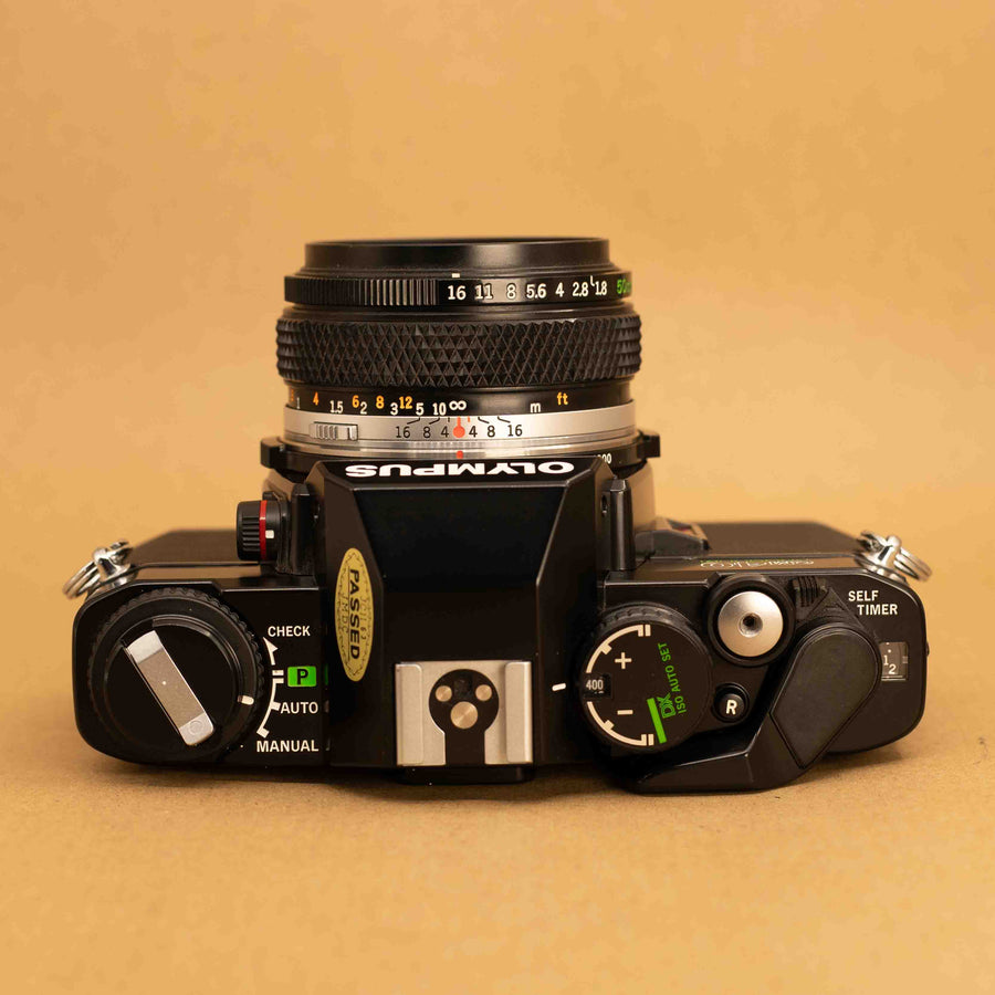 Olympus OM40 Program in Black with 50mm f/1.8 Lens