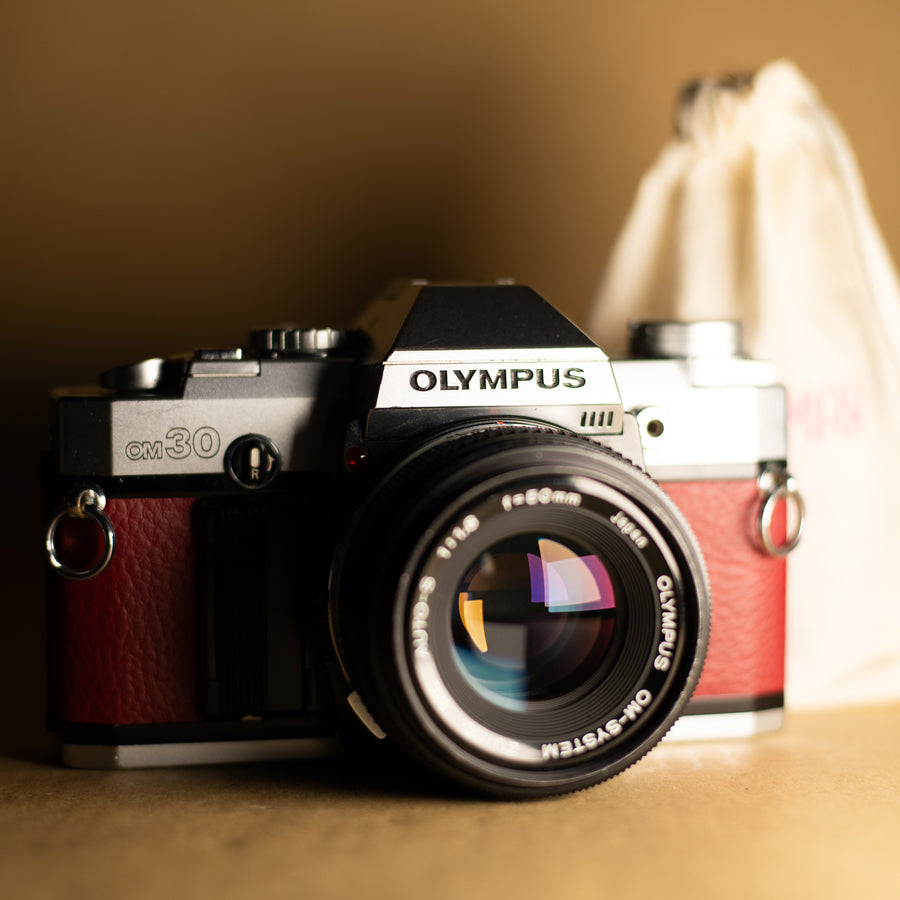 Olympus OM30 in Burgundy with 50mm f/1.8 Lens